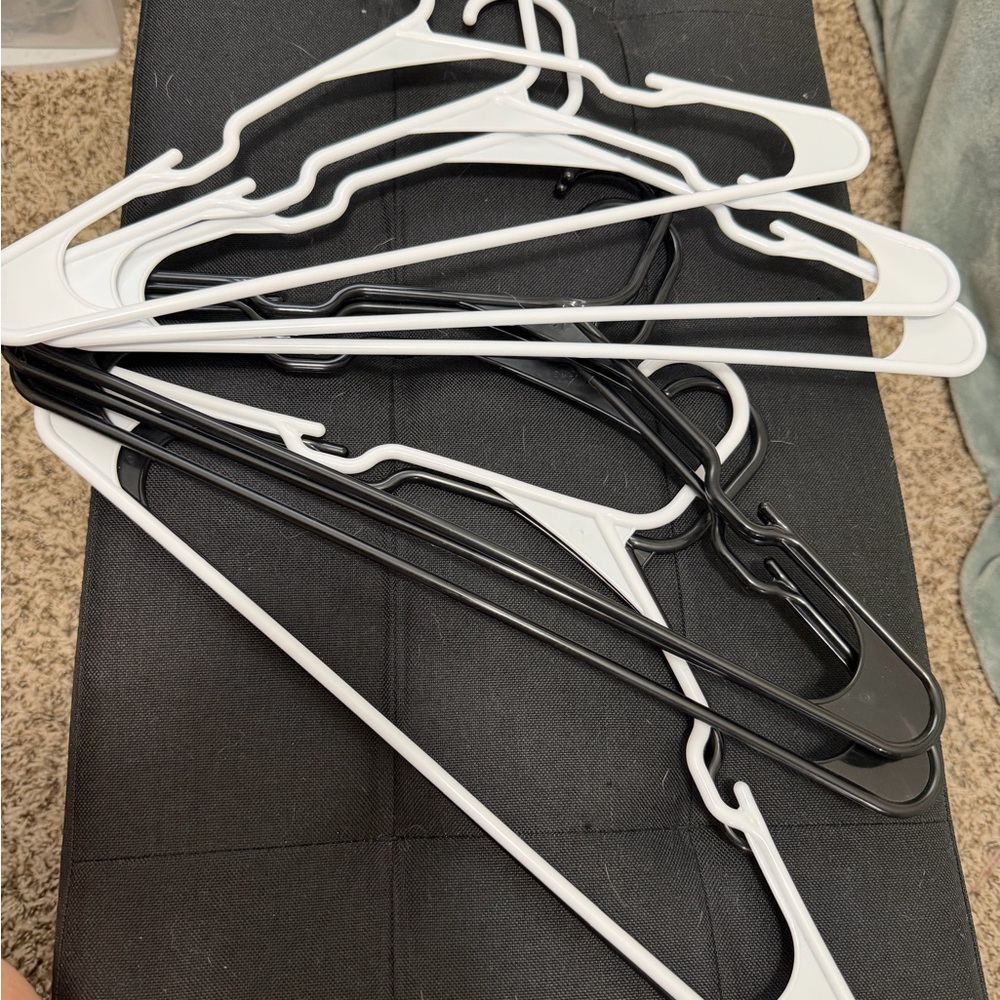 Set of Black and White Plastic Hangers